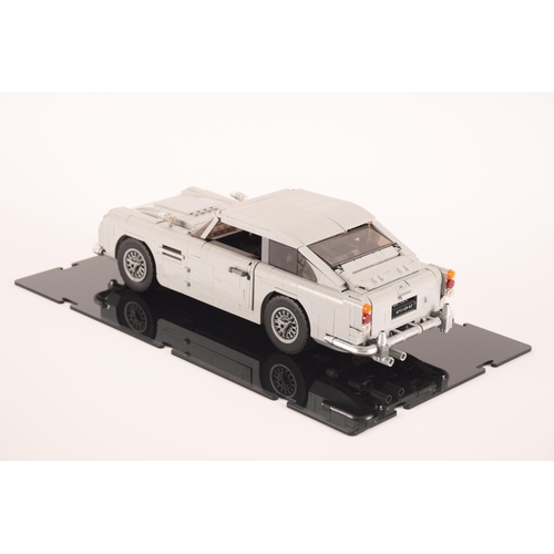 147 - A pre constructed Lego Aston Martin DB5 in custom made display case, 30 x 10cm not including case. I... 