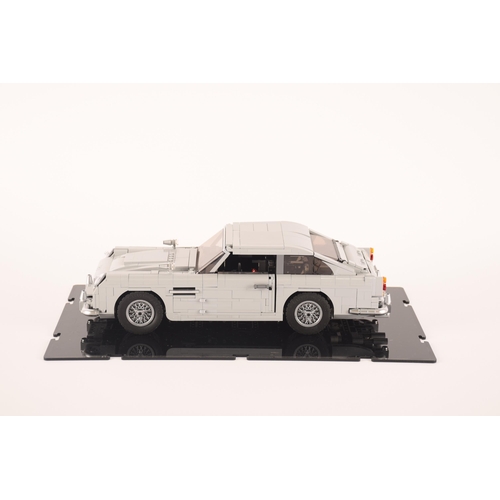 147 - A pre constructed Lego Aston Martin DB5 in custom made display case, 30 x 10cm not including case. I... 