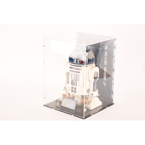 148 - A pre-constructed Lego Star Wars R2D2 in custom-built display cabinet, having various working mechan... 