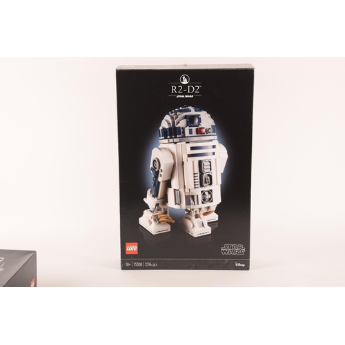 148 - A pre-constructed Lego Star Wars R2D2 in custom-built display cabinet, having various working mechan... 