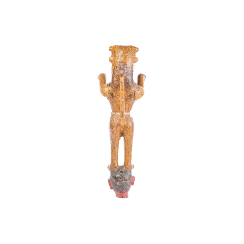 27 - An Indian painted and carved wood figure of a crowned tiger, standing on his hind legs with arms out... 