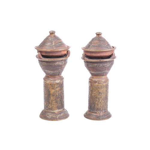 29 - Two vintage pottery standing tagine pots, with applied metal covers and cylindrical stands for ember... 