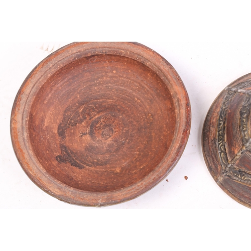 29 - Two vintage pottery standing tagine pots, with applied metal covers and cylindrical stands for ember... 