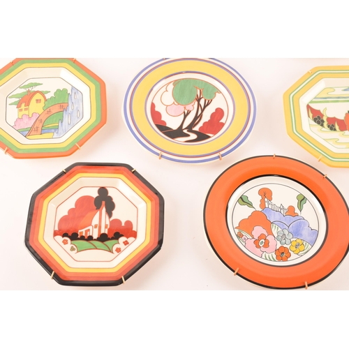 63 - After Clarice Cliff; a collection of four octagonal decorative plates by Wedgwood in the Mistique co... 