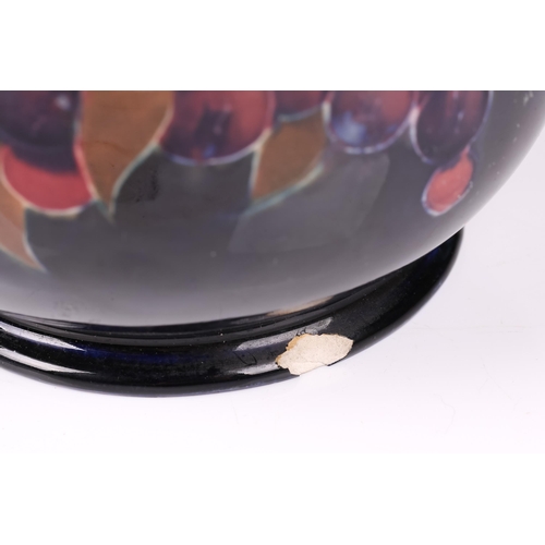 67 - William Moorcroft, a large Pomegranate pattern vase, circa 1915, of double gourd form with impressed... 