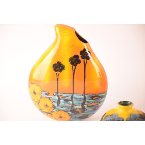 69 - Anita Harris; a collection of ceramics comprising five vases of varying sizes, shapes and patterns, ... 