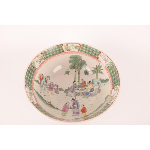 70 - A large Chinese famille rose bowl, 20th century, the interior decorated with figures in a garden, 14... 