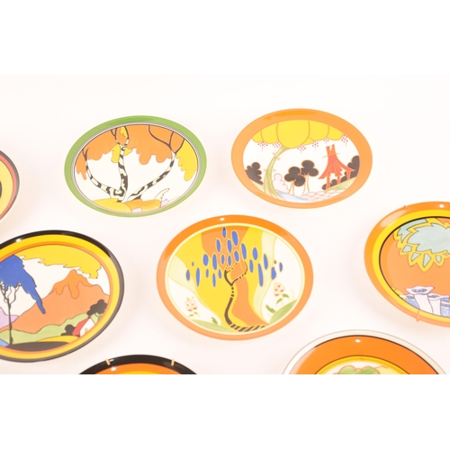 90 - After Clarice Cliff; a collection of ten Wedgwood decorative plates comprising four from the 'World ... 