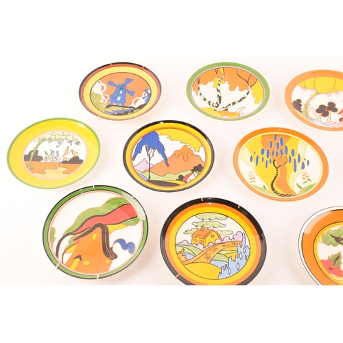 90 - After Clarice Cliff; a collection of ten Wedgwood decorative plates comprising four from the 'World ... 