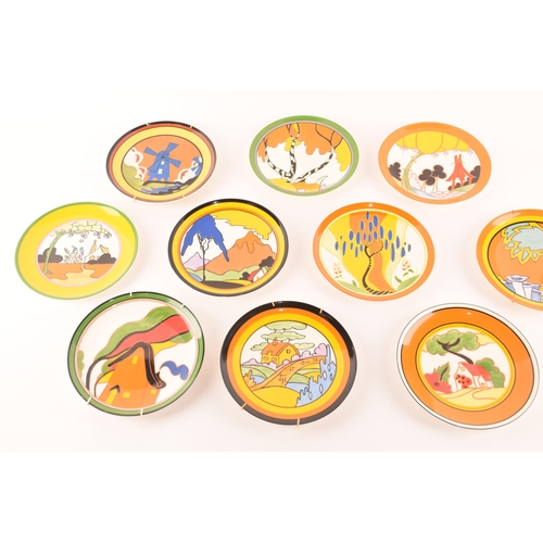 90 - After Clarice Cliff; a collection of ten Wedgwood decorative plates comprising four from the 'World ... 