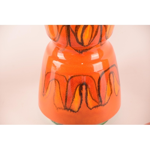 94 - Poole; a collection of ceramics comprising of six vases of varying shapes, sizes and patterns, signe... 