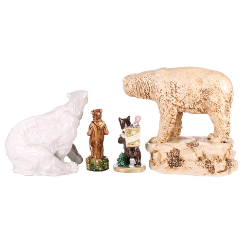 97 - A 20th-century large Royal Dux porcelain figure of a seated polar bear, 26 cm high, together with a ... 