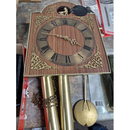 Coo coo clock with brass anvil man with pendulum and weights