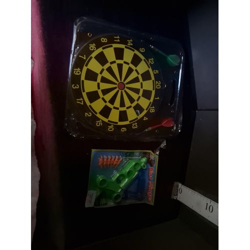 dartboard and gun
