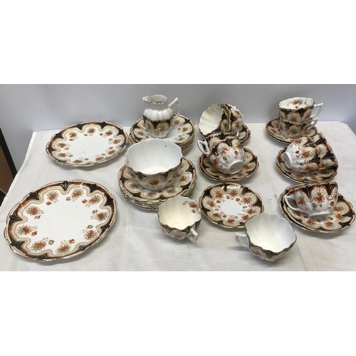 100 - Victoria Melba china part tea set, 2 cake plates. 12 side plates, milk jug, sugar bowl, 11 cups.