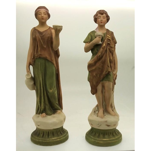 104 - A pair of Royal Dux figures 18cm h.