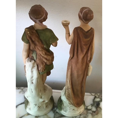 104 - A pair of Royal Dux figures 18cm h.