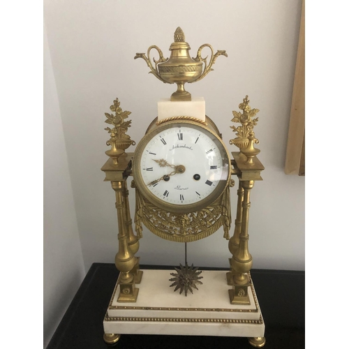 1055 - A 19thC French gilt and white marble portico clock, dial signed Archambaut Aaria. 48cms h x 26cms w ... 