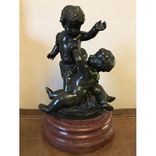 1057 - Bronze group - after Michael Clodion 1738-1814, 3 cherubs on marble base, signed. 30cms h.