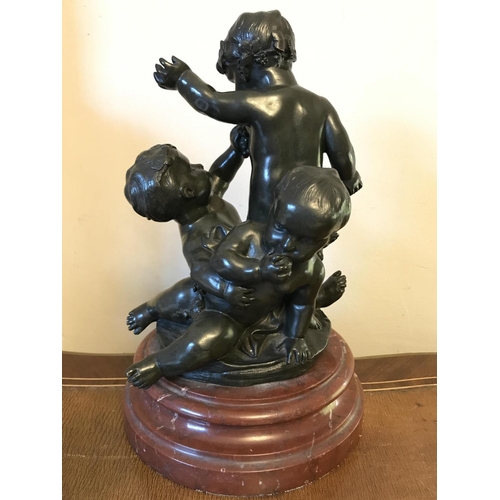 1057 - Bronze group - after Michael Clodion 1738-1814, 3 cherubs on marble base, signed. 30cms h.