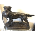After Jules Moigniez, large bronze figure of a retriever with pheasant on naturalistic base. 43cms h... 