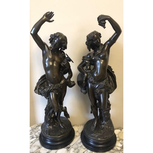 1068 - After François Théodore Devaulx, a pair of bronze bacchanalian figures. 59cms h