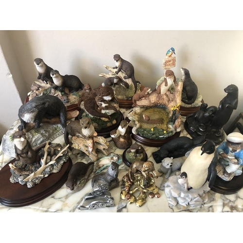 110 - Nineteen various otter figures to include Border Fine Art, Royal Doulton, Wedgwood and a Border Fine... 