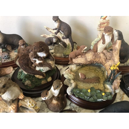 110 - Nineteen various otter figures to include Border Fine Art, Royal Doulton, Wedgwood and a Border Fine... 