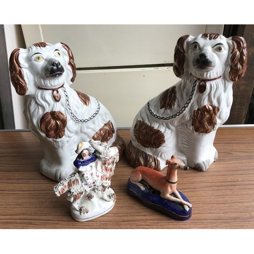 111 - Staffordshire pottery pair of Spaniel dogs, 25cms h together with a small Staffordshire figure of a ... 