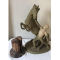 Marble column bookends and a Goldscheider model of a man and horse (painted) 42cms h.