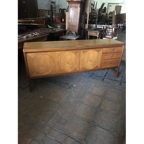 1365 - Mid century teak sideboard, circular panel doors, 3 drawers. 183 w x 45 d x 78cms h.