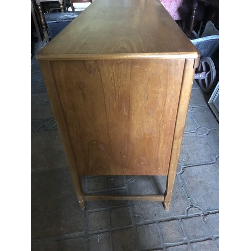 1365 - Mid century teak sideboard, circular panel doors, 3 drawers. 183 w x 45 d x 78cms h.