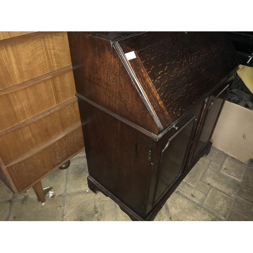 1374 - An 18thC oak bureau, fitted interior, cupboard base on bracket feet. 79 w x 43 d x 95cms h.