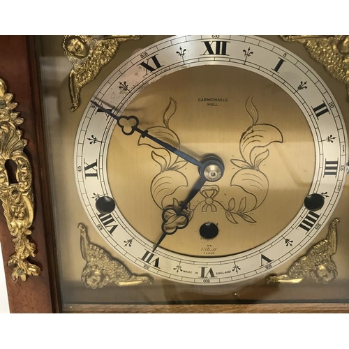 1378 - Mahogany cased Elliot mantle clock with Westminster chime and brass decoration. Carmichaels of Hull.... 