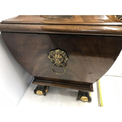 1379 - Mahogany Sarcophagus shaped box with metal liner on ball and claw feet and brass lion head handles. ... 