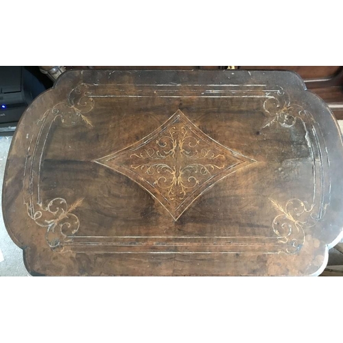 1395 - A 19thC walnut work and games table. 60 x 40 x 75cms h.