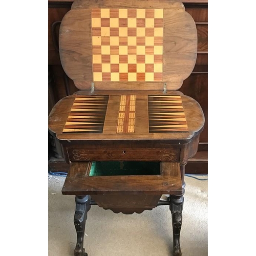 1395 - A 19thC walnut work and games table. 60 x 40 x 75cms h.