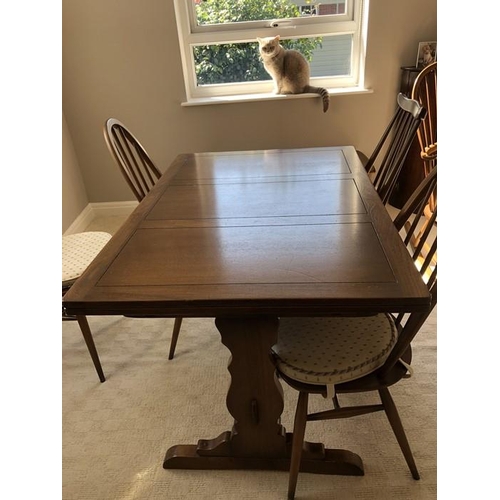 1401 - Ercol draw leaf dining table.