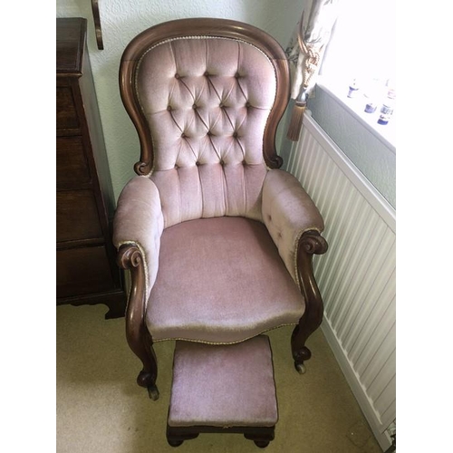 1411 - A 19thC spoon back armchair and matching upholstered footstool.