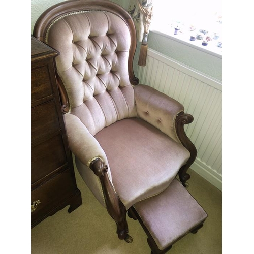 1411 - A 19thC spoon back armchair and matching upholstered footstool.