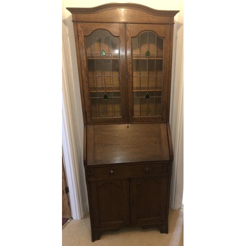 1412 - An oak bureau bookcase, leaded doors to top, 182 h x 87 w x 35cms d.