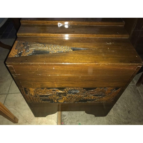 1420 - A camphorwood chest with oriental carving to top and sides.