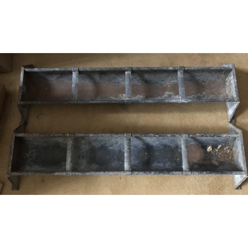 1438 - Two galvanised metal feeding troughs. 88 x 28cms.