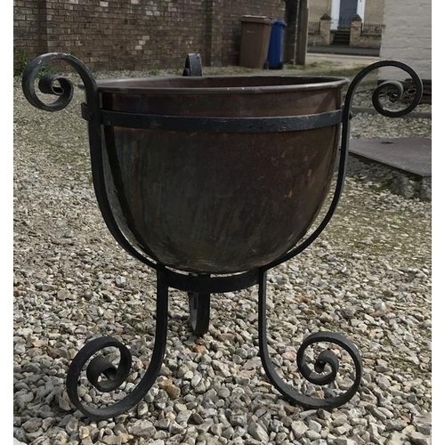 1445 - Copper bowl planter on a wrought metal stand 46cm h.