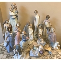 Nao figurines, 16 various, 39cms h including bride and groom, mother and baby, dogs etc, all good co... 