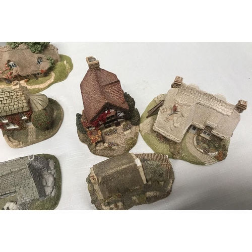 31 - Collection of 17 Lilliput Lane cottages including St Mary's Church.