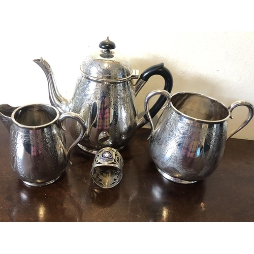 454 - Silver plate teapot, milk and sugar with a White Star Line plated napkin ring.