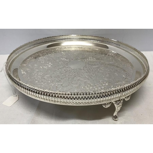 468 - A modern silver plated round tray. 35cms d.