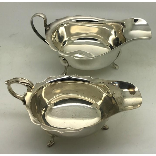 472 - Two hallmarked silver sauce boats, Birmingham 1951 and Sheffield 1962, maker Viner's Ltd. Total weig... 