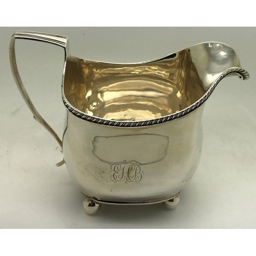 474 - George III silver cream jug, London 1812, maker Peter and William Bateman. 164.9gms with gadroon bor... 